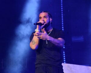 The Sad, Eerie Reason This Picture of Drake on Tour is Going Viral