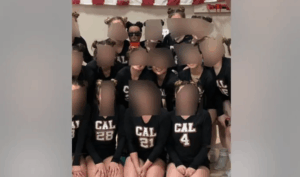 White Cheer Squad Use Black Mannequin as Unofficial Mascot