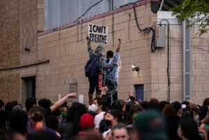 Minneapolis Police Confront Protesters After George Floyd's Death; Sister Calls for Cops to Face Murder Charges