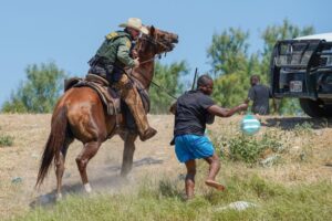 Border Patrol Investigating ‘Challenge Coin’ Depicting Infamous Haitian Migrant Picture In Texas