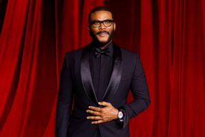 What the Hell Was Tyler Perry Whispering to That Pole Dancer at Usher’s Concert?! We Have An Idea