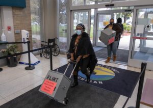 Robocall Disinformation Campaign Tells Flint Voters to Avoid Long Lines and Vote After Election Day
