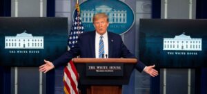 The Teddy Riley of Presidents Is Using Props at His Press Conferences to Rewrite History