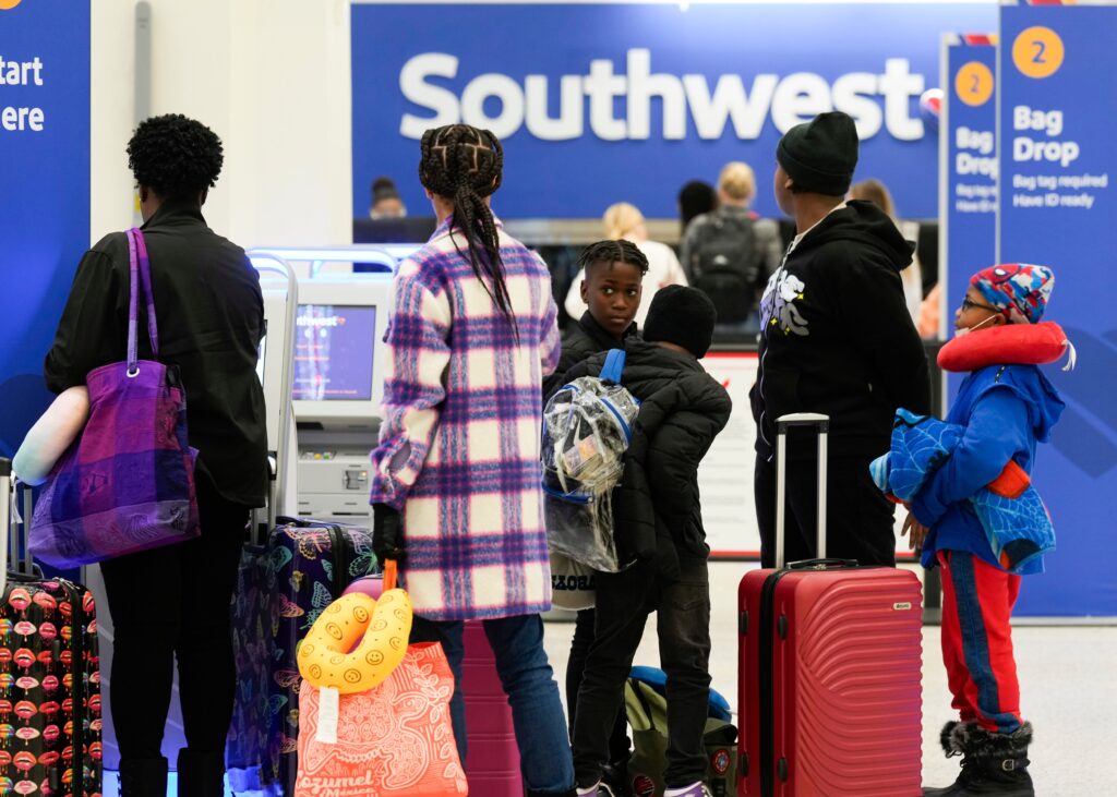 A Southwest Airlines Passenger Opened The Emergency Exit and Made His Escape!!?