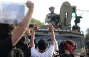 As Officials Warn of Second Coronavirus Wave Due to Mass Protests, Demonstrators Weigh the Risks