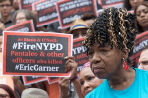 These Lyin’ Eyes? Cop’s Lawyer Says NYPD Surgeon Saw No Choke Hold in Eric Garner Death