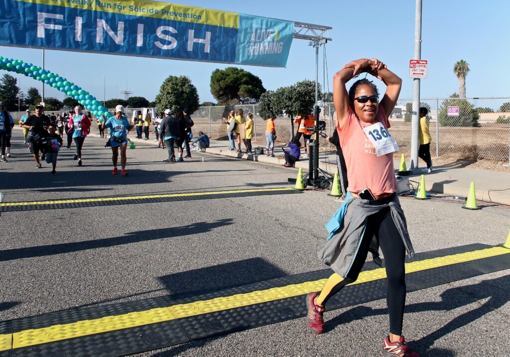 It Runs in the Family: While Meghan Skypes Malawi, Mom Doria Ragland Runs a 5K for Charity—and Inspires a Romance Novel