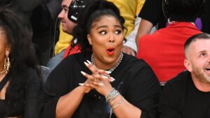 Not Like This: We Love Lizzo’s Boldness—but Girl, Please Don’t Put Your Bare Backside on a Stadium Seat!