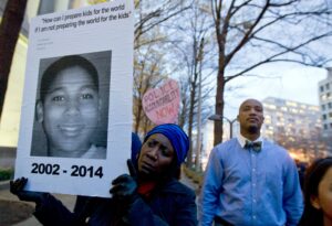 'They're Harboring a Murderer': Protest Erupts After Officer Who Killed Tamir Rice Is Welcomed By Cleveland Football Team