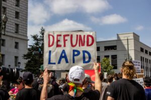 LAPD Officers Accused of Sharing George Floyd Valentine's Day Photo That Reads 'You Take My Breath Away'