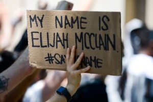 Aurora, Colo., Officers Under Investigation for Allegedly Appearing in Photos Mocking Elijah McClain’s Death at His Memorial